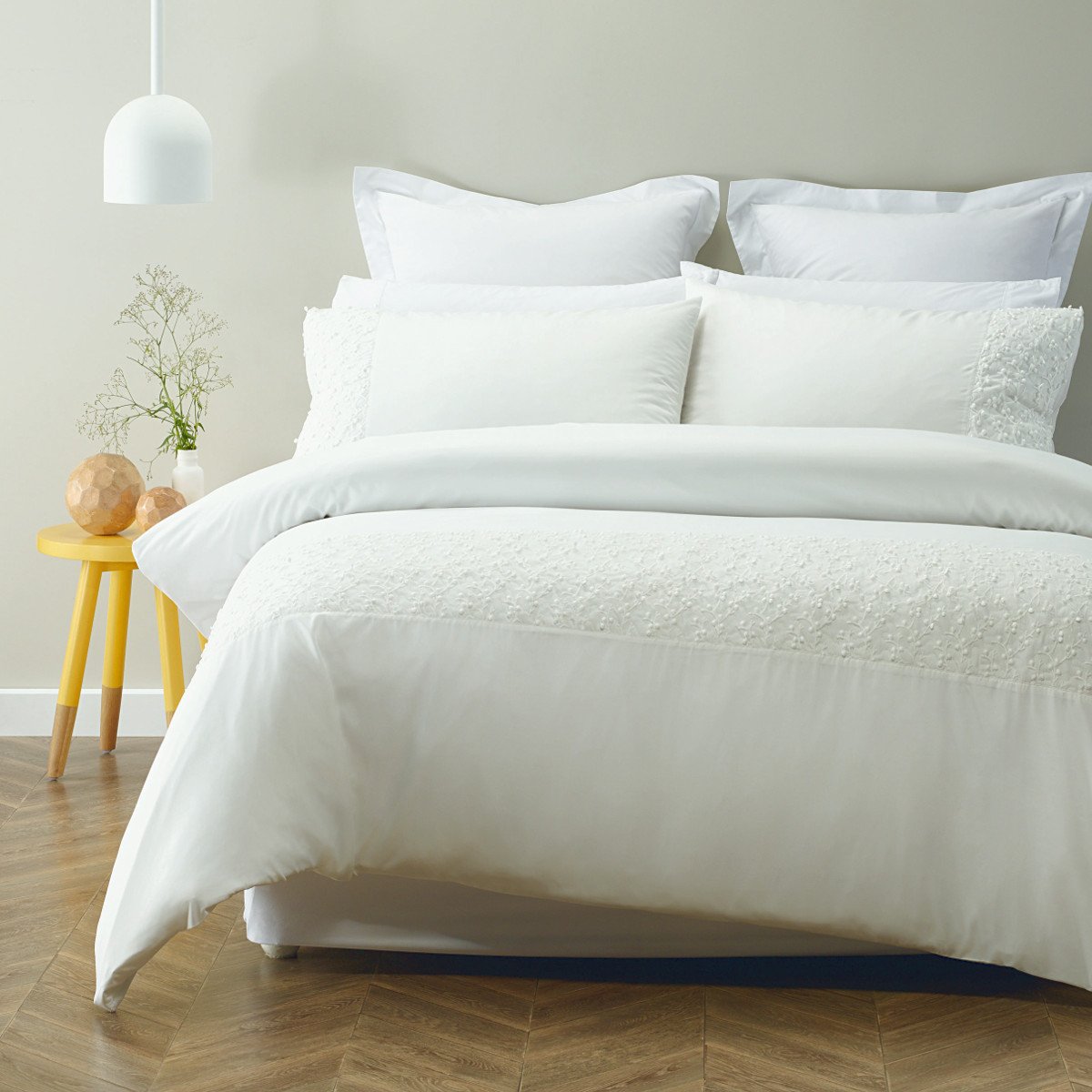 Appliqued soft feel polyester duvet cover set. Ivory quilt cover set.