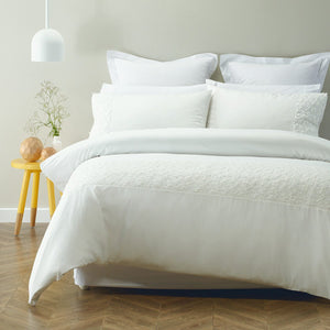 Appliqued soft feel polyester duvet cover set. Ivory quilt cover set.