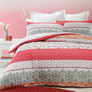 Quilted effect, modern duvet cover set in white, red and pink print. Reversible.