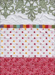 Quilted effect, modern duvet cover set in white, red and pink print. Reversible.