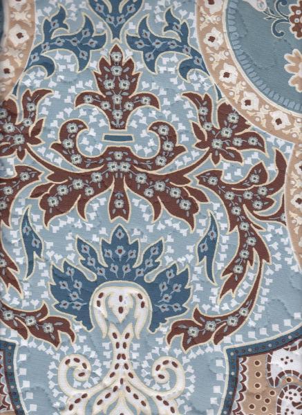 Reversible, Classic, soft colors like white, blue and beige feature on this quilt cover set.